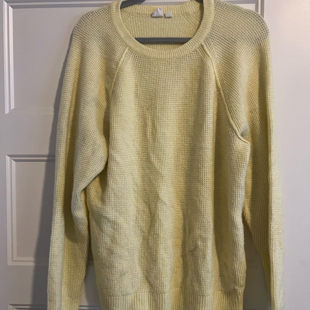 Pale yellow sweater